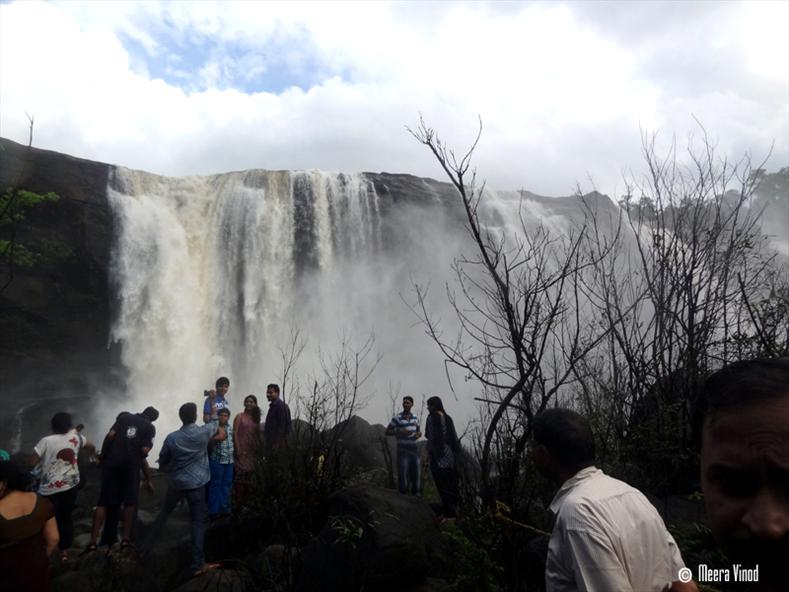 Athirappilly Falls view below from the flat rocky surface.