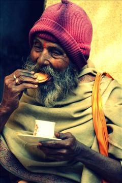 Old Man Having Tea