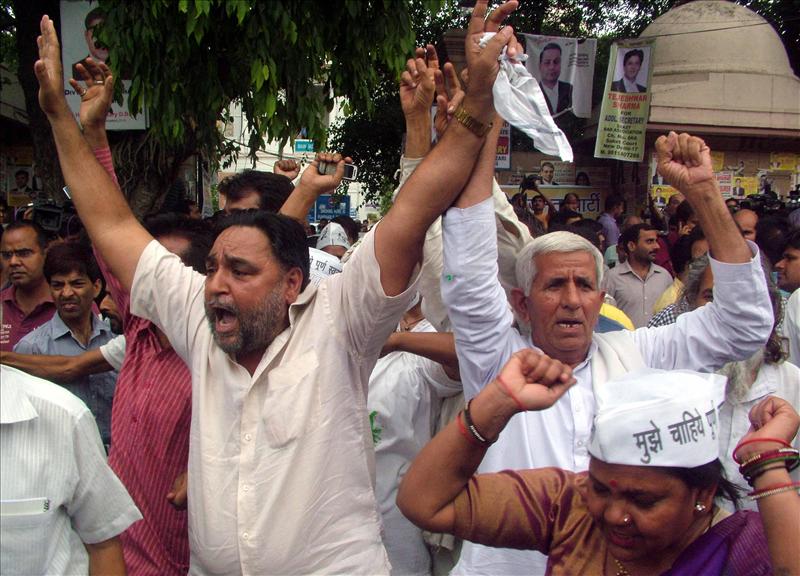 AAM workers protest in Delhi on May 23, 2014