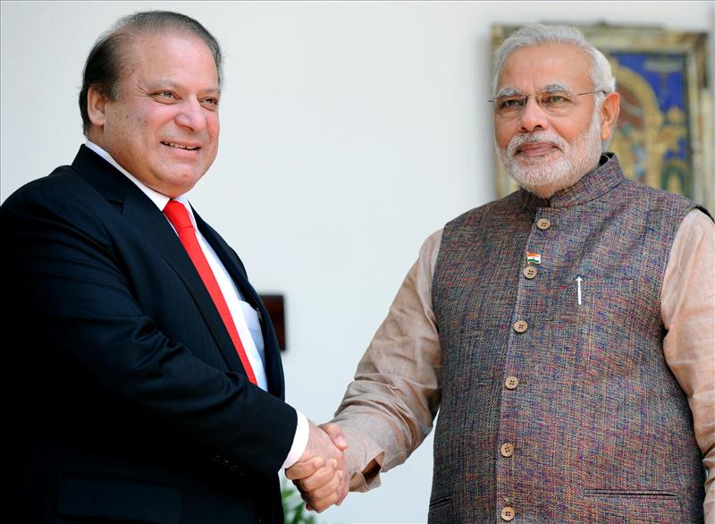 PM Modi shakes hands with PM Nawaz Sharif