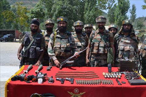 Arms and ammunition recovered from militants in Baramulla