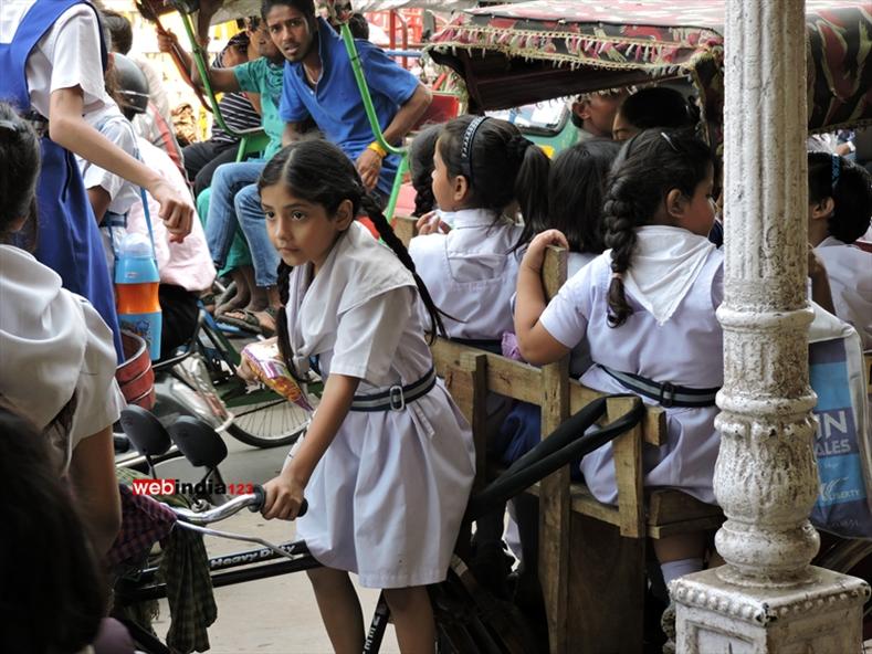 School children on Rickshaw