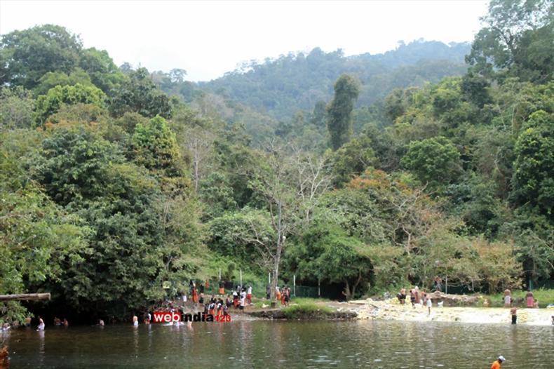 Pilgrims taking a holy dip at Pamba River