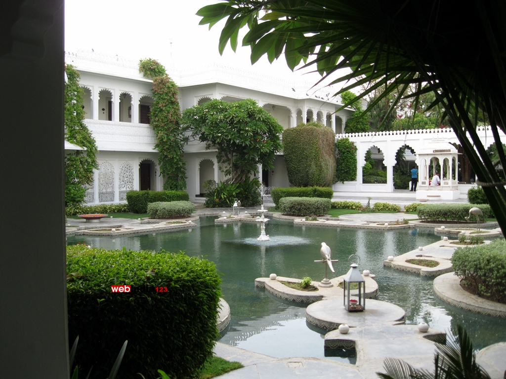 Taj Lake Palace Udaipur- Inner garden with a pond