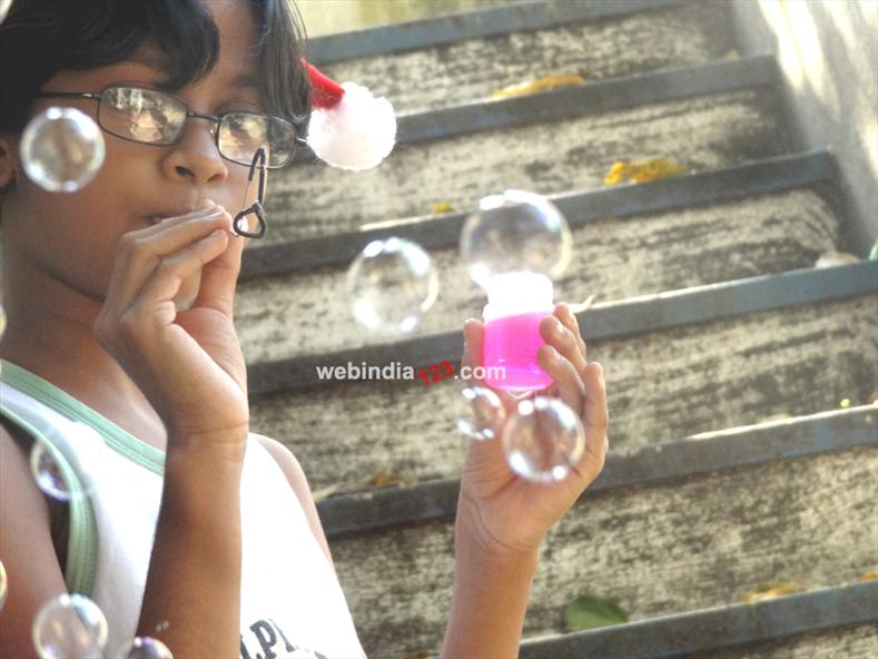 Vandu Blowing Bubbles on Christmas Morning