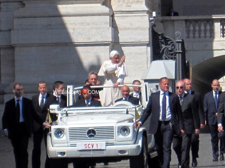 Pope Benedict XVI waving to the crowd