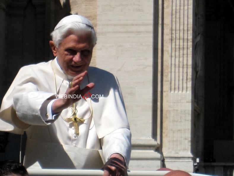 Pope Benedict XVI waving to the crowd